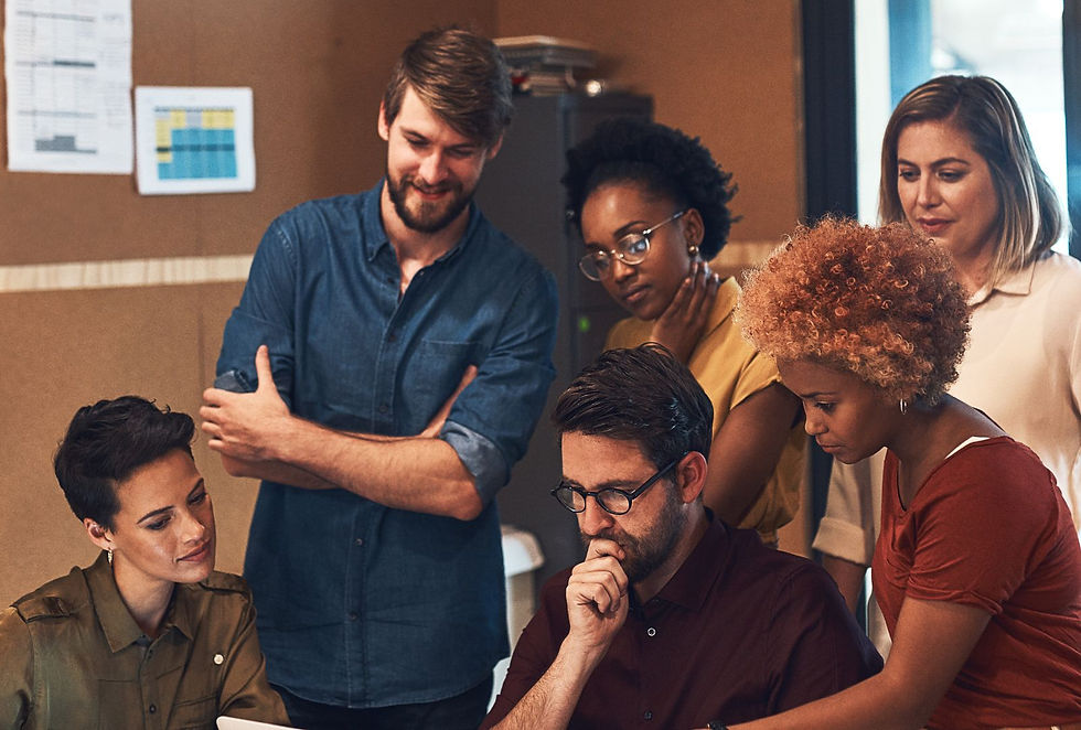 HR professionals analyzing workforce data on a computer screen
